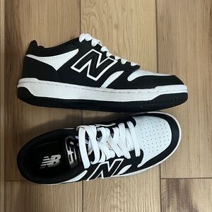 New Balance Black and White Low-Top Sneakers